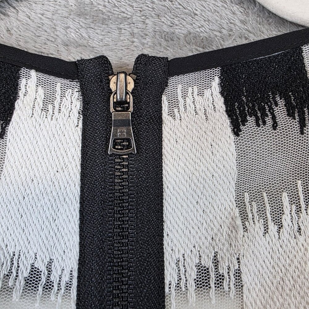BCBGMAXAZRIA Blouse Womens S Black White Geometric Asymmetrical Peplum Top Lined - Picture 8 of 11